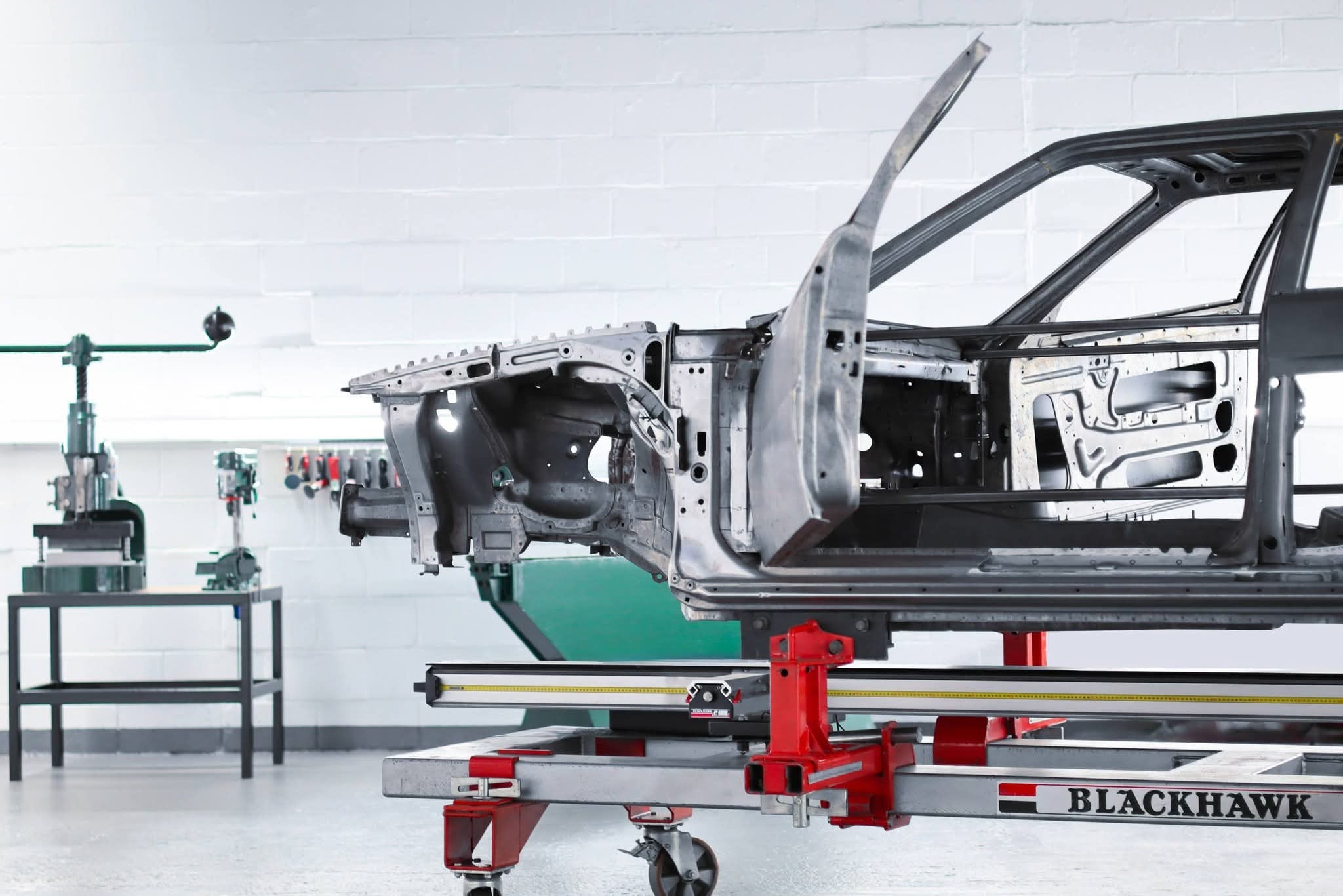 Space Saver Auto Lifts real installation — car body on assembly lift